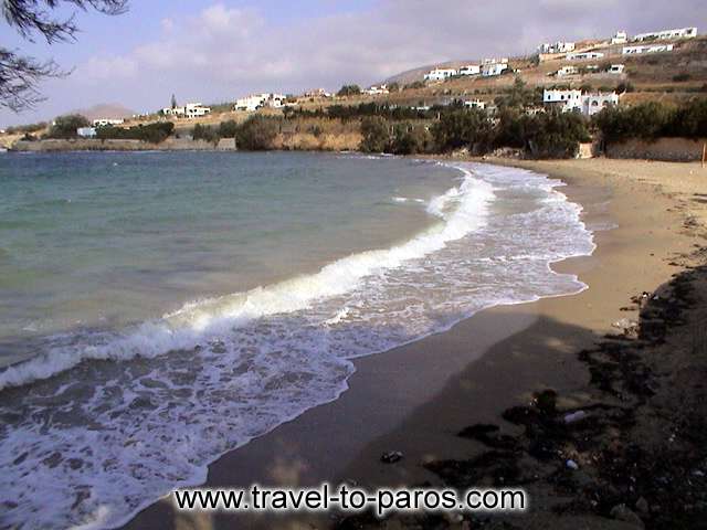PARASPOROS BEACH - The clean light blue waters and the golden sands characterize the Parasporos beach.