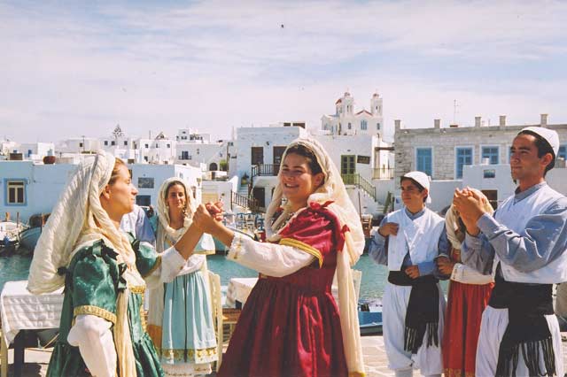 THE MUSIC - DANCE GROUP - The members of the group dance wearing traditional costumes.