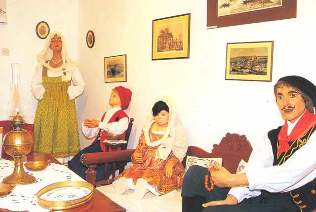 TRADITIONAL COSTUME - The Medieval costumes of Paros that exhibited in the “Folklore Collection Museum”.