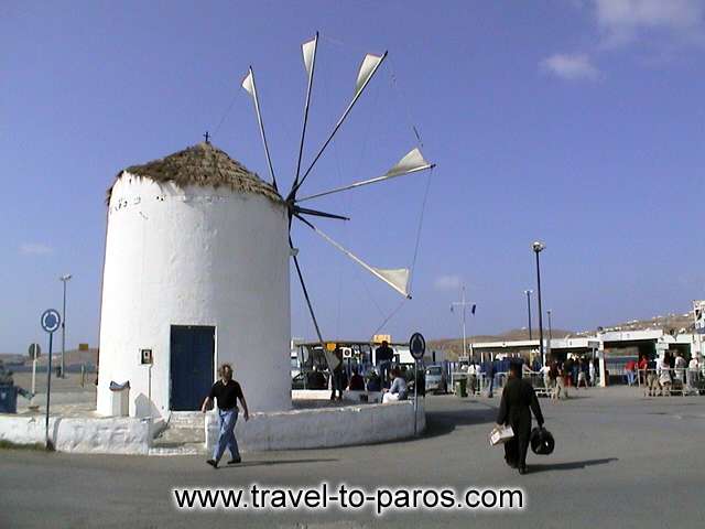 Symbol for the harbour of Paros constitutes the square with the windmill. PAROS PHOTO GALLERY - PARIKIA PORT