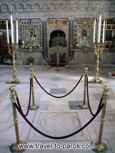 EKATONTAPYLIANI CHURCH - A view of the temple and the Byzantium blazon.