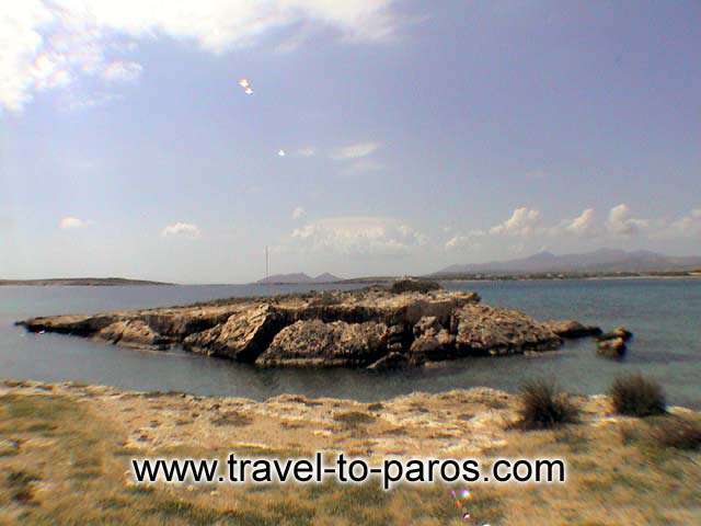 SANTA MARIA BEACH - In near distance from the beach of Santa Maria we find a small rocky island.