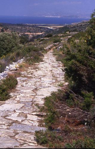 BYZANTINE WALKABOUT - The kalderimi is lined with old marble and takes you down through the rural countryside of eastern Paros for 3-4 km. Naxos is clearly visible across the narrow sea strait. We walked the ancient road alone on this day.
