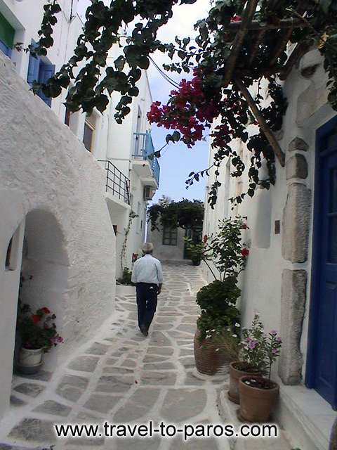PARIKIA PAROS - The streets that are paved with slabs, the flowers, the cleanliness and the people are creating the unique atmosphere of Parikia.